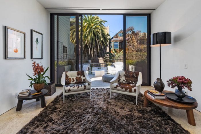 Cowhide chairs in small beautiful room
