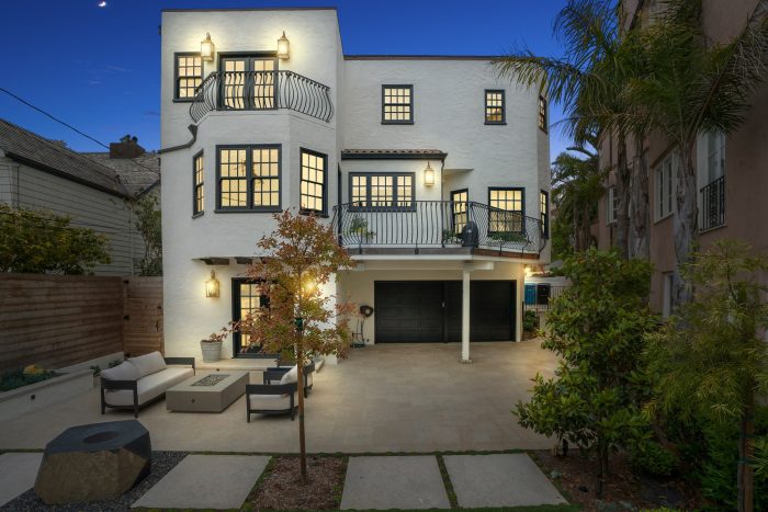 Compass St. Francis wood home at sunset.