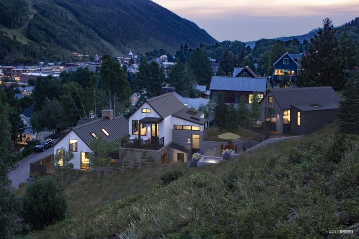 View of Telluride at dusk. Steep hills and warm homes. 