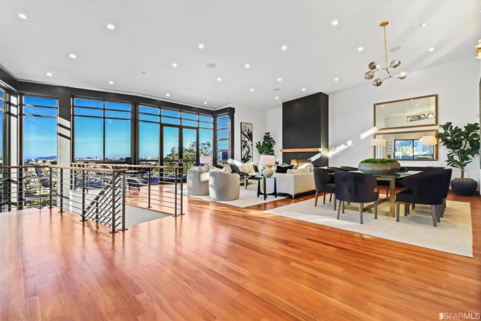 Open livingspace with vaulted ceilings and view of downtown SF