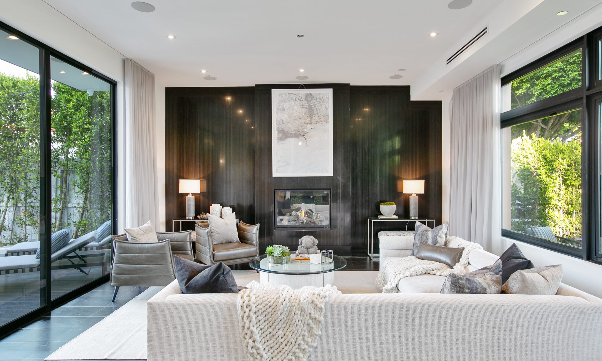 Fireplace and couch in Hollywood home