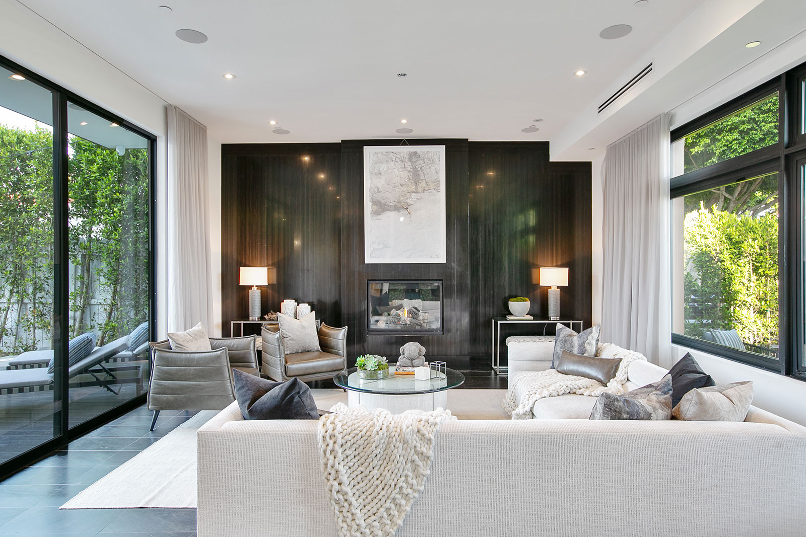 Fireplace and couch in Hollywood home