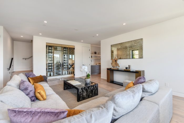 The tranquil spa includes a sauna, steam shower, towel warmer, vanity and private water closet.