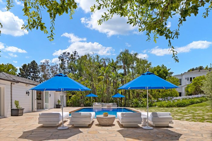 Pool with lounges and umbrellas.