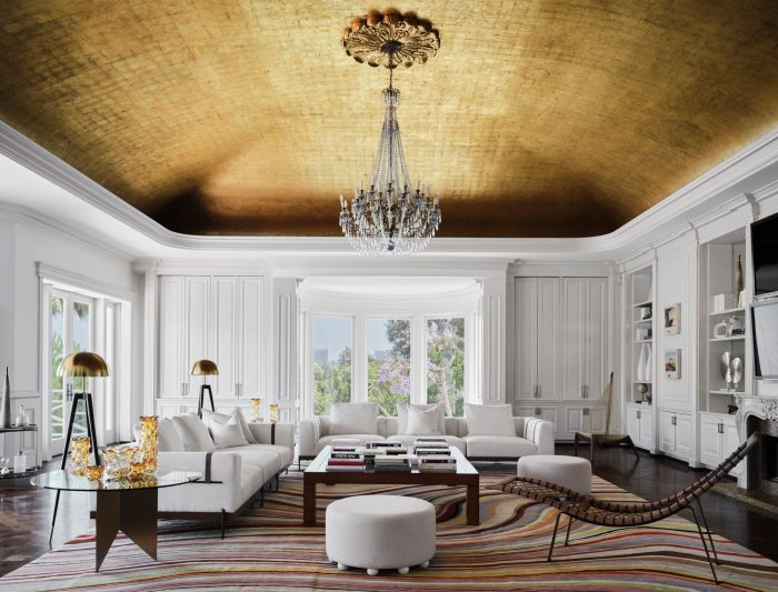 Grand living room with chandelier gold foiled concave ceiling.