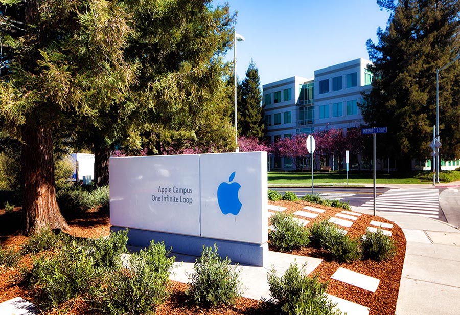 Apple headquarters campus entrance with infinite loop sign