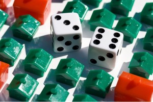 gamble Illustration of Monopoly game pieces and dice