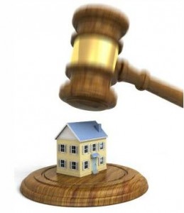 gavel Illustration of a judge's gavel coming down on a house