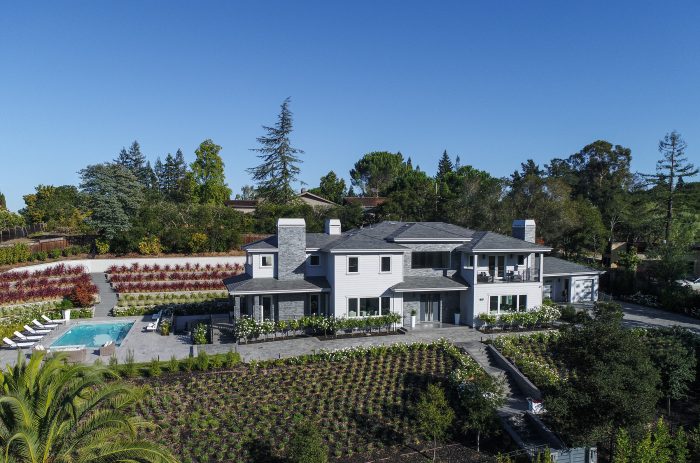 Large Atherton estate. Aerial view with pool palm trees and vineyards.