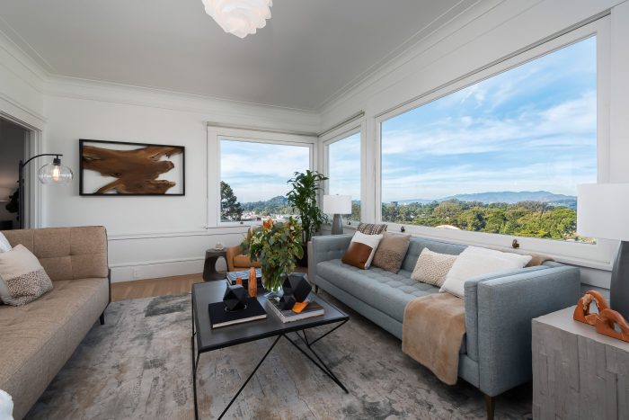living room with large windows and a view of Mt. Tam