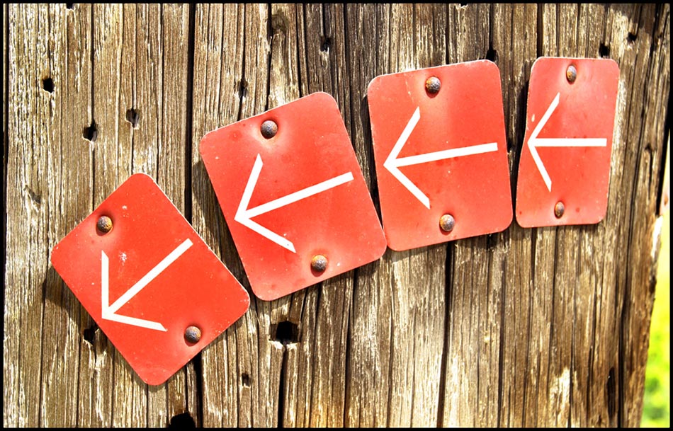 red down arrows fence