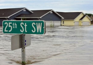 underwater Photo of homes partially under water.