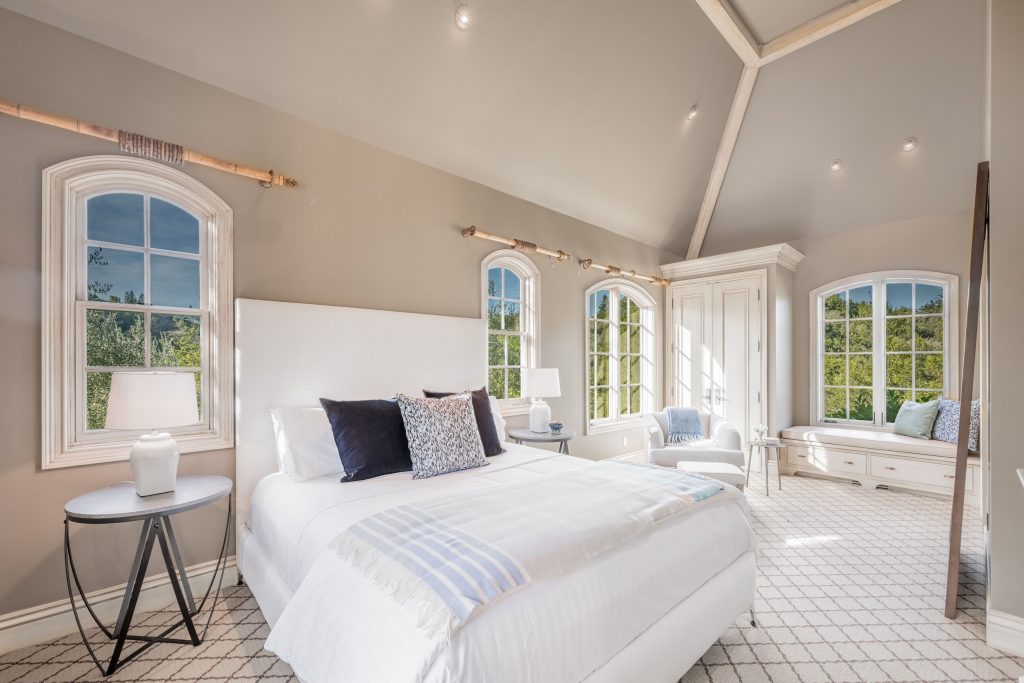 Bedroom with high ceilings. 